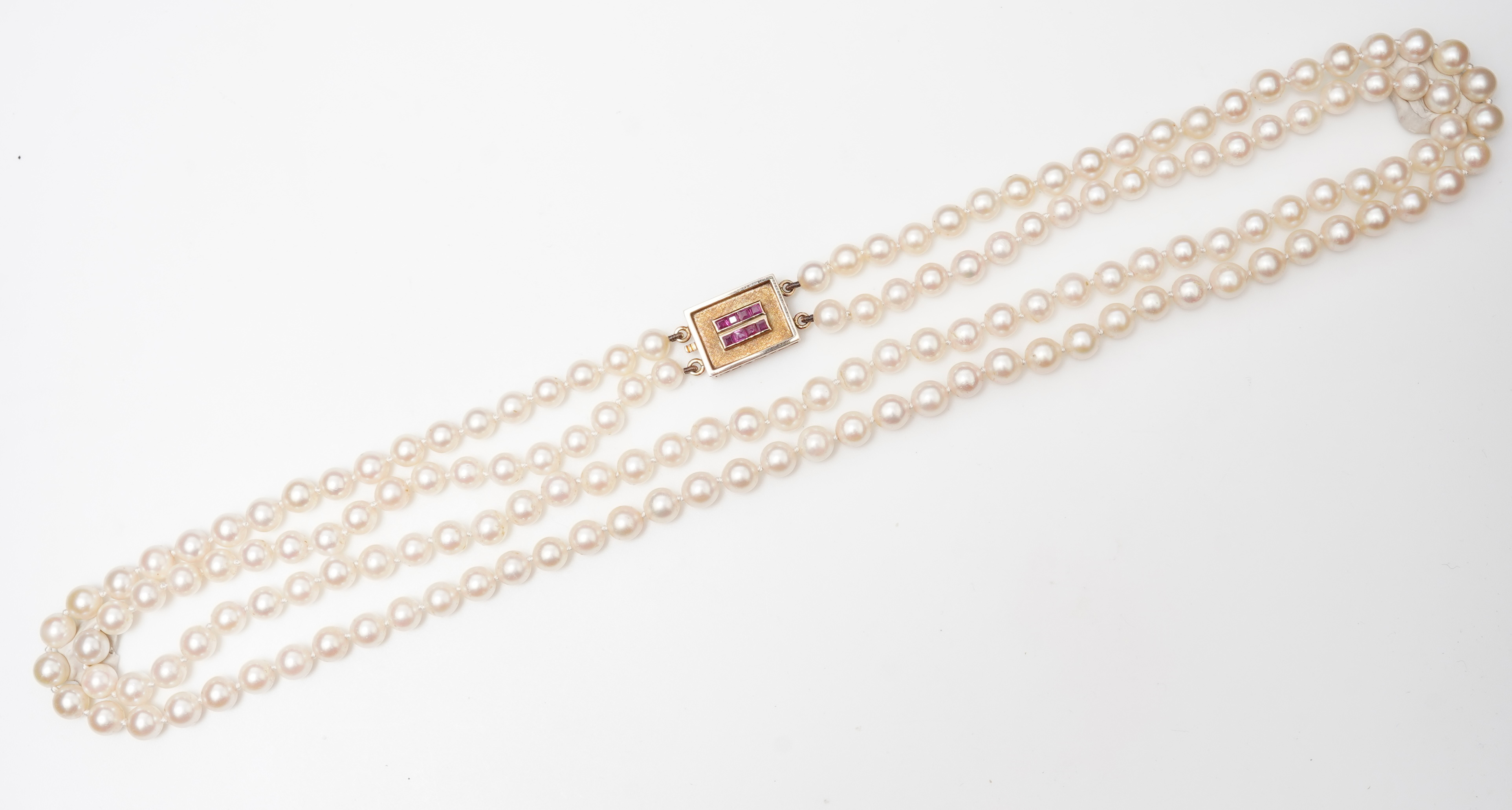 A cultured pearl and ruby necklace